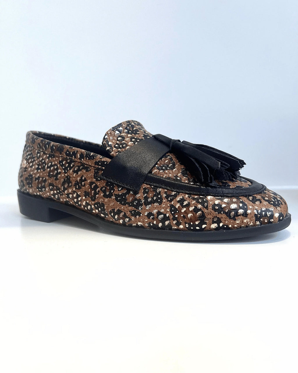 MOCASIN ANIMAL PRINT CON BORLAS