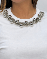 BUSO DETALLE CUELLO PERLAS